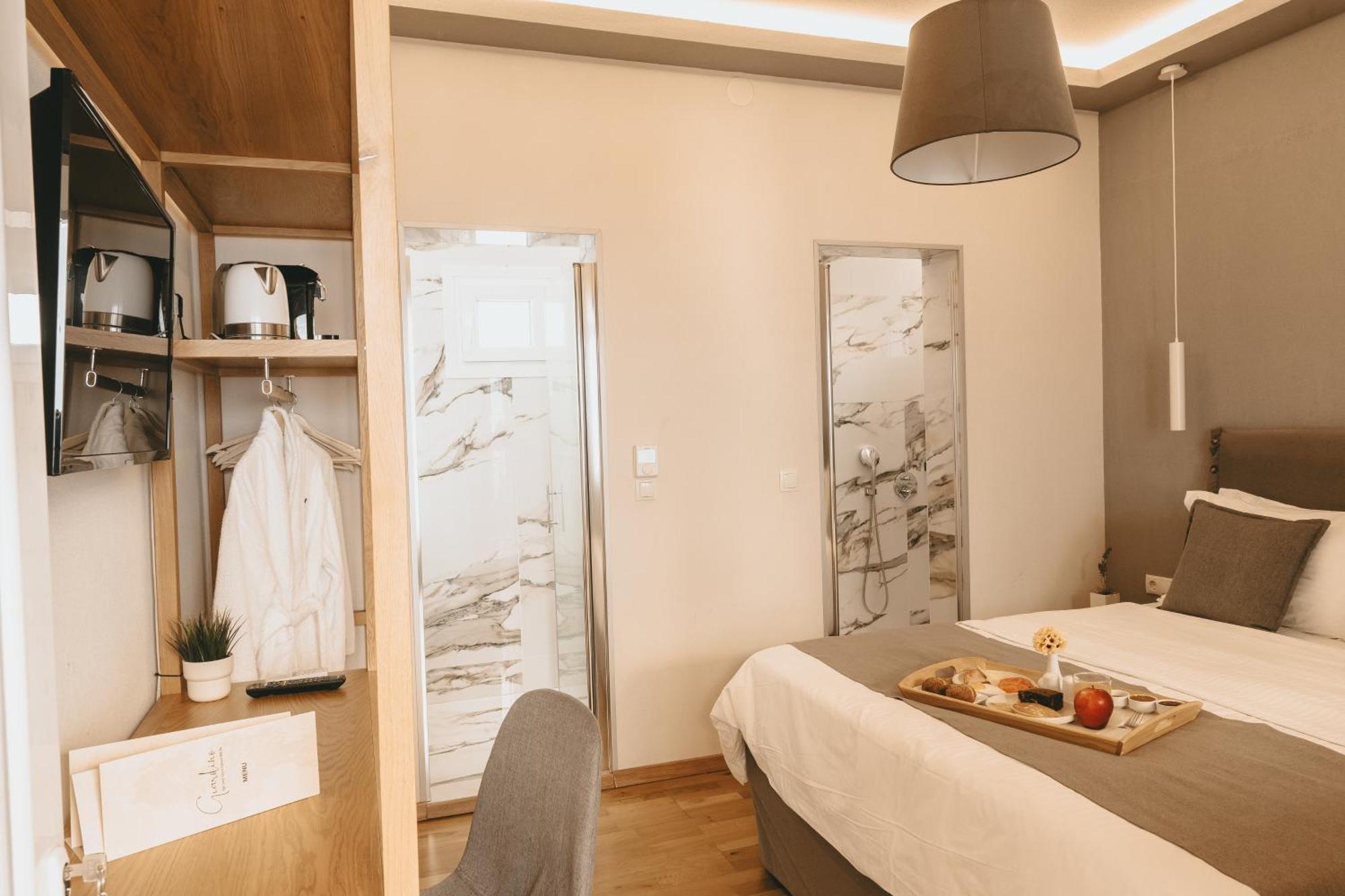 Giardino High Living Suites Dráma Quarto foto